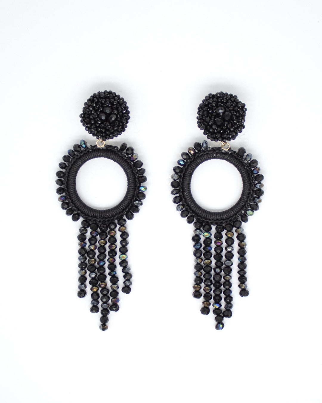 Black beaded earrings with circular designs and dangling beads on a white background